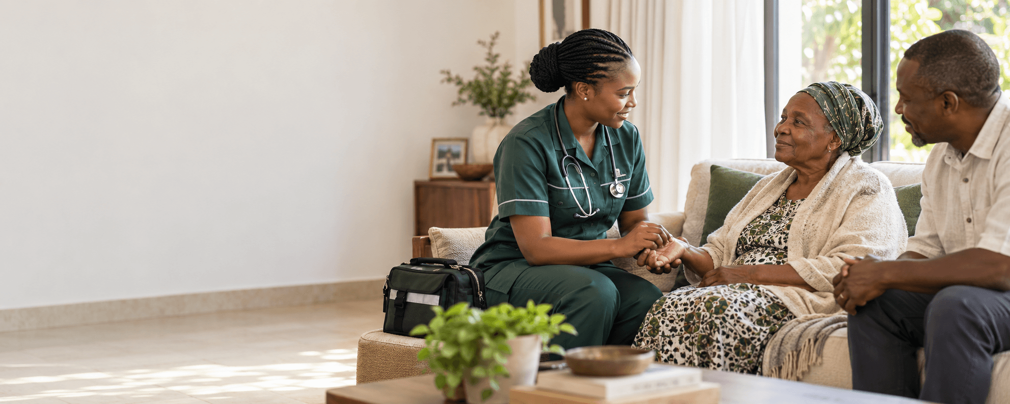 Healthcare professional supporting a patient and family at home